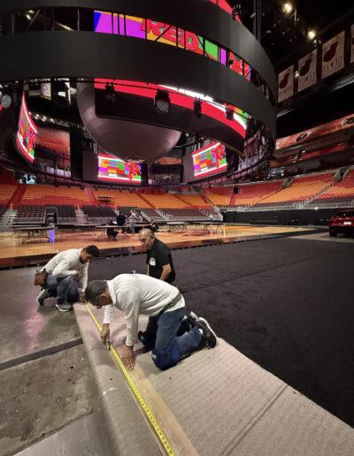 Velasquez Carpet commercial stadium flooring and protective carpet setup
