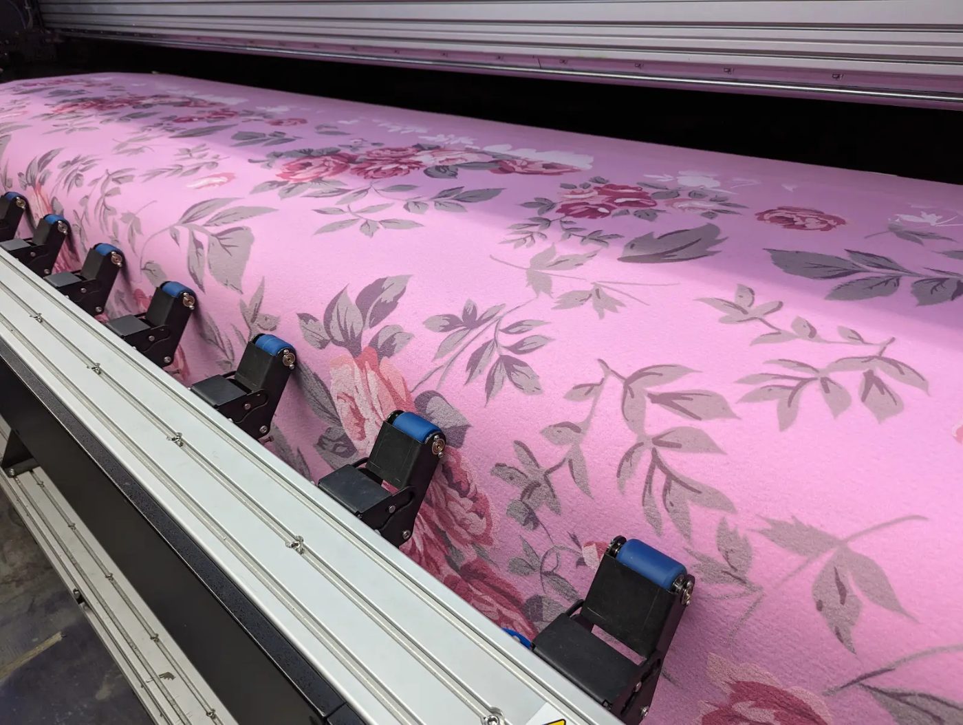 Large-format printer producing custom printed carpet for an event