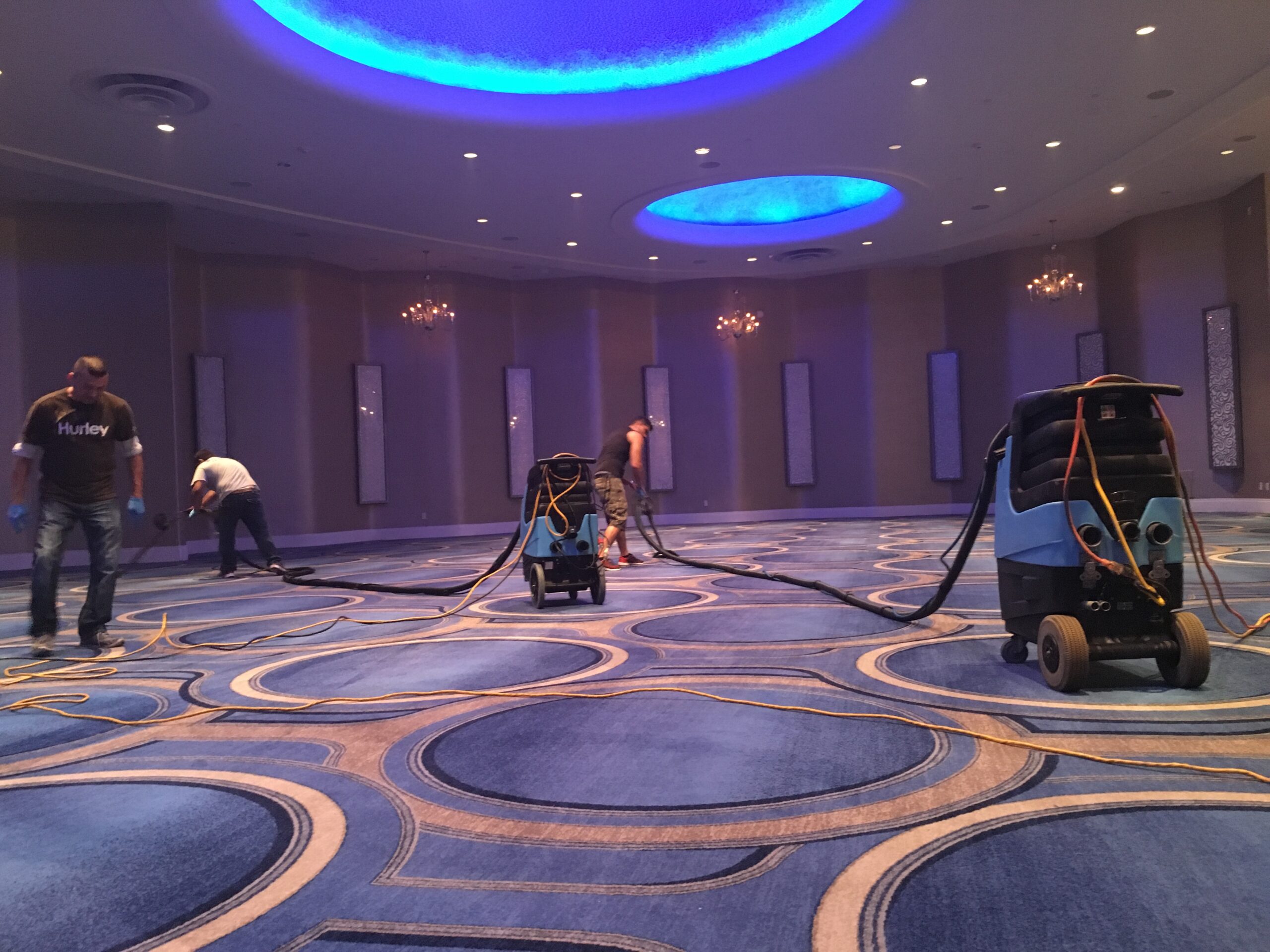 Hotel ballroom carpet cleaning, South Florida Velasquez Carpet crew cleaning carpet in a hotel ballroom in South Florida